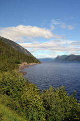 Obraz premium Crystal clear water of Lake Tinnsja (Tinn, Tinnsjo or Tinnsjoen) in Telemark County, Norway, one of the largest lakes in Norway, and one of the deepest in Europe