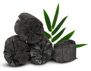 Natural wood charcoal isolated on white background