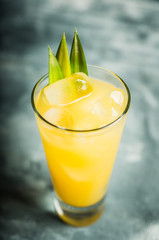 Pineapple cocktail in highball glass. Selective focus. Shallow depth of field.