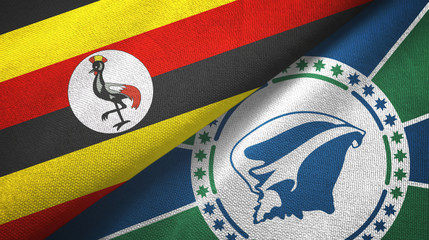 Fototapeta premium Uganda and Martinique two flags textile cloth, fabric texture