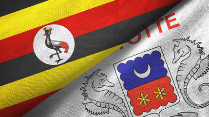 Fototapeta premium Uganda and Mayotte two flags textile cloth, fabric texture