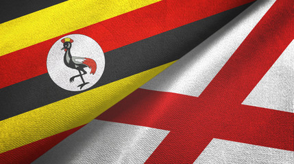 Fototapeta premium Uganda and Northern Ireland two flags textile cloth, fabric texture