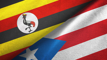 Fototapeta premium Uganda and Puerto Rico two flags textile cloth, fabric texture