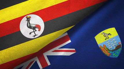 Fototapeta premium Uganda and Saint Helena two flags textile cloth, fabric texture