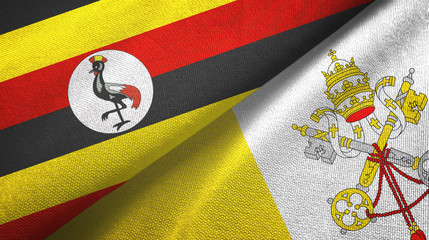 Fototapeta premium Uganda and Vatican two flags textile cloth, fabric texture