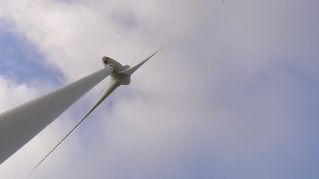 eolic turbine wind renewable energy farm on top of mountain 4k