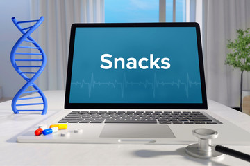 Snacks – Medicine/health. Computer in the office with term on the screen. Science/healthcare