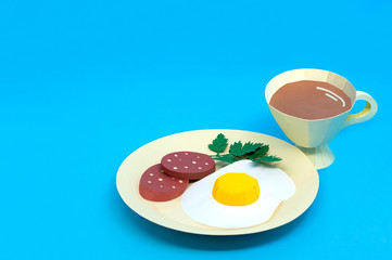 Paper fried, salami slices and tea in cup