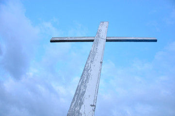 gray cross against the sky