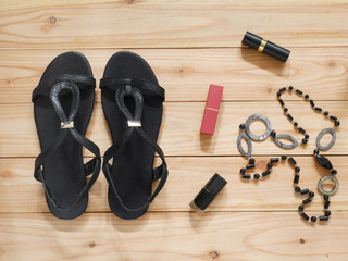 Sandals, nail polish, necklace and lipsticks