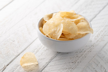 Potato chips heaping in a bowl