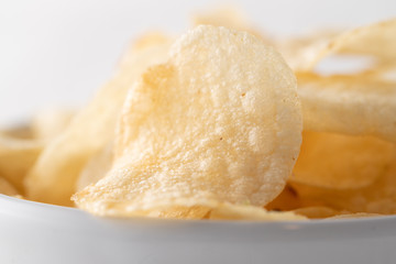 Potato chips heaping in a bowl