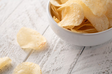 Potato chips heaping in a bowl