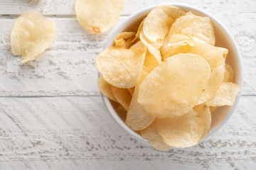 Potato chips heaping in a bowl