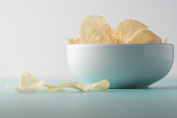 Potato chips heaping in a bowl