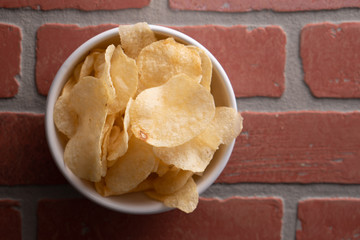 Potato chips heaping in a bowl