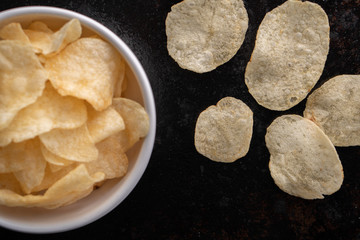 Potato chips heaping in a bowl