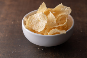 Potato chips heaping in a bowl