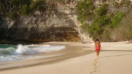woman walking on the beach