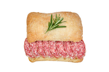 sandwich ciabatta bread with sliced sausages salami in white mold. white background isolated 
