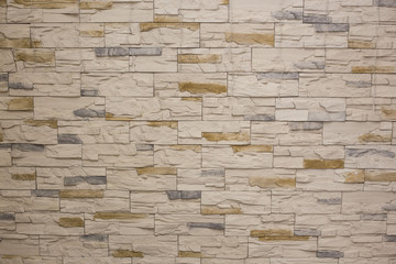 Tiled brick wall in interiors design.