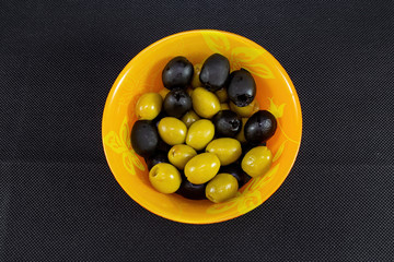 green olives in a glass bowl