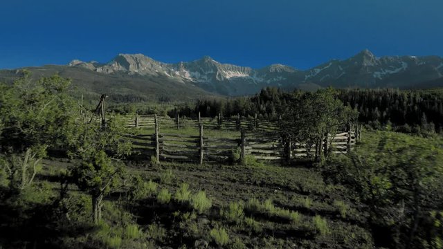 Dallas Divide view of empty corral facing Mnt. Sneffels, San Juan Mountains