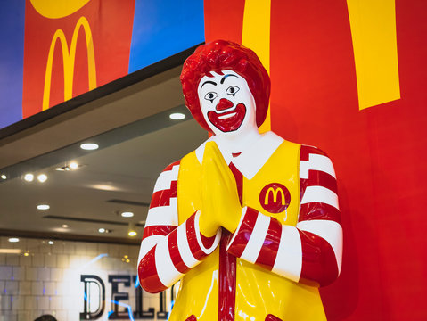 Thai Style Mc Donald Mascot in front of Shop Thailand Ronald McDonald greeting. BANGKOK, THAILAND - DEC 9, 2019