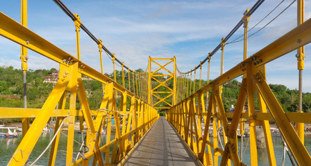 yellow bridge over river