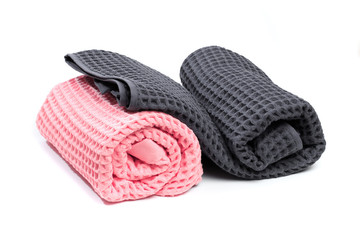 Colorful stacked bath towels isolated on white background. - Image