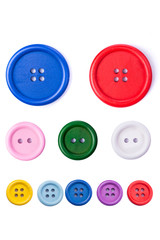Pastel plastic buttons on white