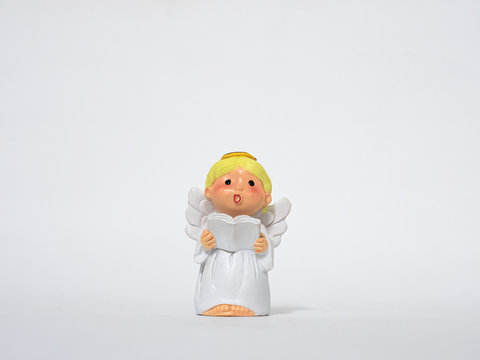 Cute angel bless or sing,  White background.