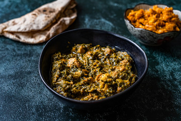 Indian Dish Spinach Lamb Palak with Gajar ka Halwa / Helva is a carrot-based sweet dessert pudding from India and Flat Bread Chappati