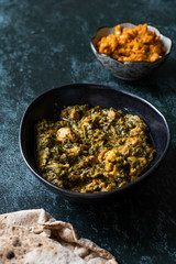 Indian Dish Spinach Lamb Palak with Gajar ka Halwa / Helva is a carrot-based sweet dessert pudding from India and Flat Bread Chappati