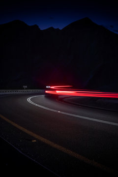highway long exposure vehicle light trails curvy highway between mountains eilat israel	