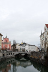 Obraz premium Ljubljana city in the evening. Cityscape with bridge. Slovenia winter 2019.