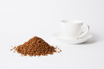 Instant coffee slide and cup for espresso on white background