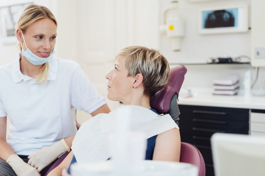 Female patient looking at the dental nurse