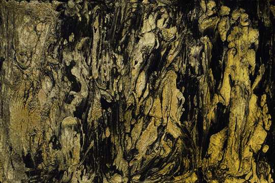 Abstract marble fluid art mix gold oil paint and black acrylic paint on paper background
