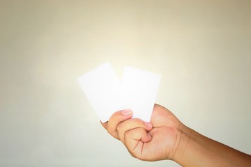 blank business card in hand isolated on white background