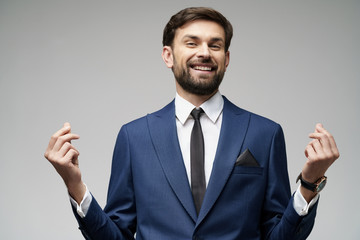 Studuo shot of thinking businessman wearing suit