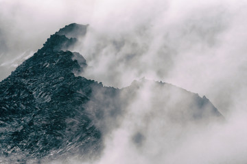 Dramatic cloudy high mountain landscape.