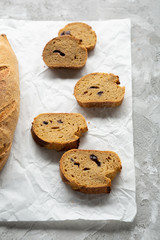 Fresh bread top view on white, whole grain