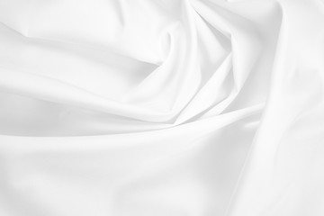 Fototapeta na wymiar Abstract white fabric texture background. Cloth soft wave. Creases of satin, silk, and cotton.