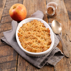 apple crumble dessert on wood background