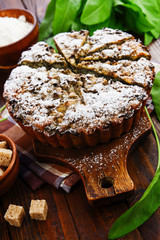 Pie with sorrel and icing sugar