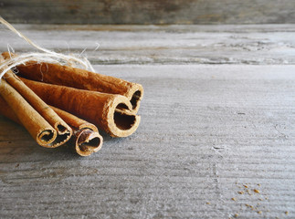 Cinnamon sticks on a wooden table