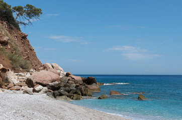 Fototapeta na wymiar A large pile of stones by the sea