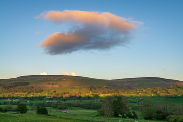 Obraz premium Evening clouds in the Yorkshire Dales near Aysgarth, North Yorkshire, England, UK