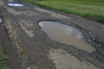 watering potholes, Central Java, Indonesia